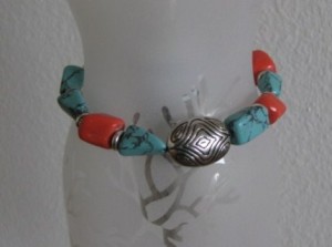 Bold orange and Coral turquoise with silver filigree beads.